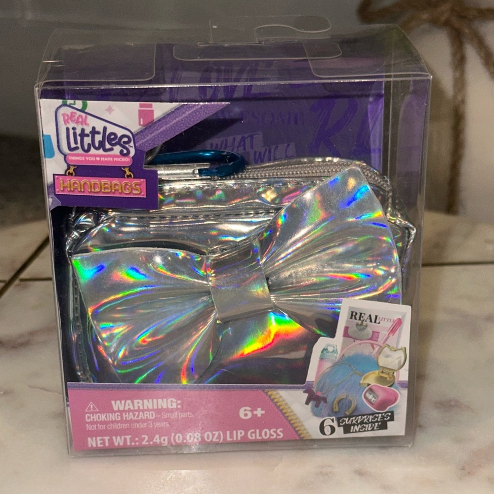 NIB REAL LITTLES Collectible Micro Handbag with 6 Beauty Surprises Inside Silver